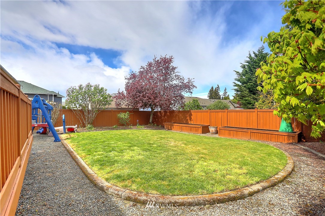 2310 Southeast 3rd Street Renton, WA 98056 - Photo 30 of 30 a view of swimming pool with a yard
