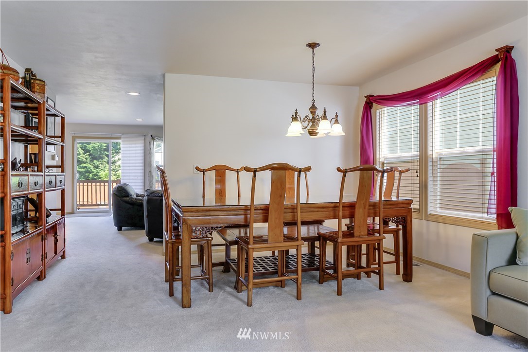 2310 Southeast 3rd Street Renton, WA 98056 - Photo 6 of 30 a view of a dining room with furniture and a window