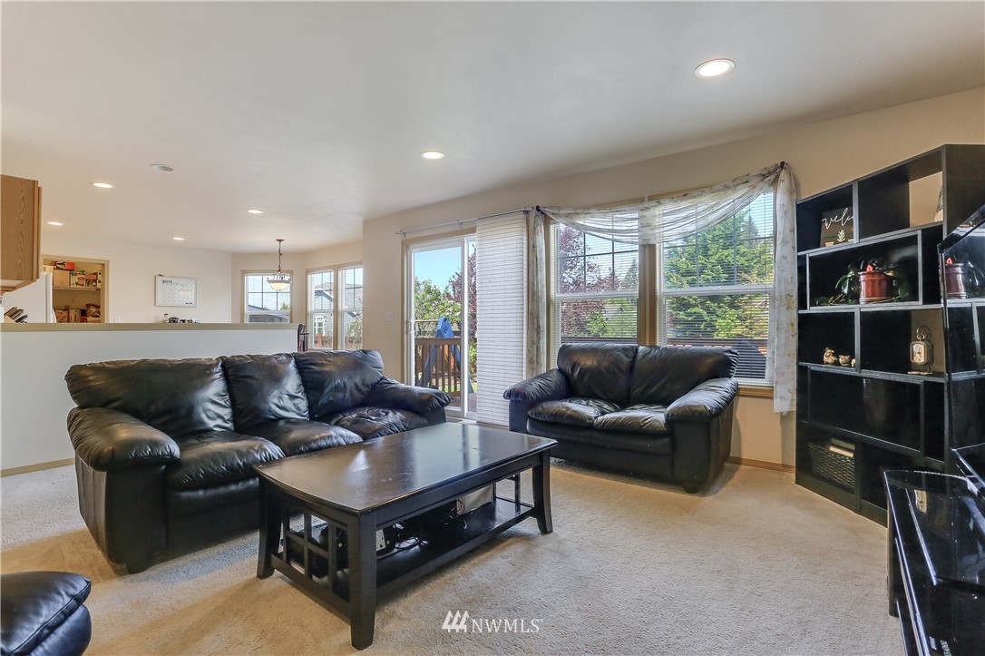 2310 Southeast 3rd Street Renton, WA 98056 - Photo 8 of 30 a living room with furniture and a large window