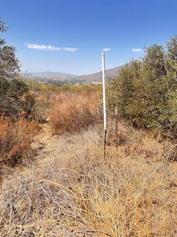 a view of mountain view with mountains in the background