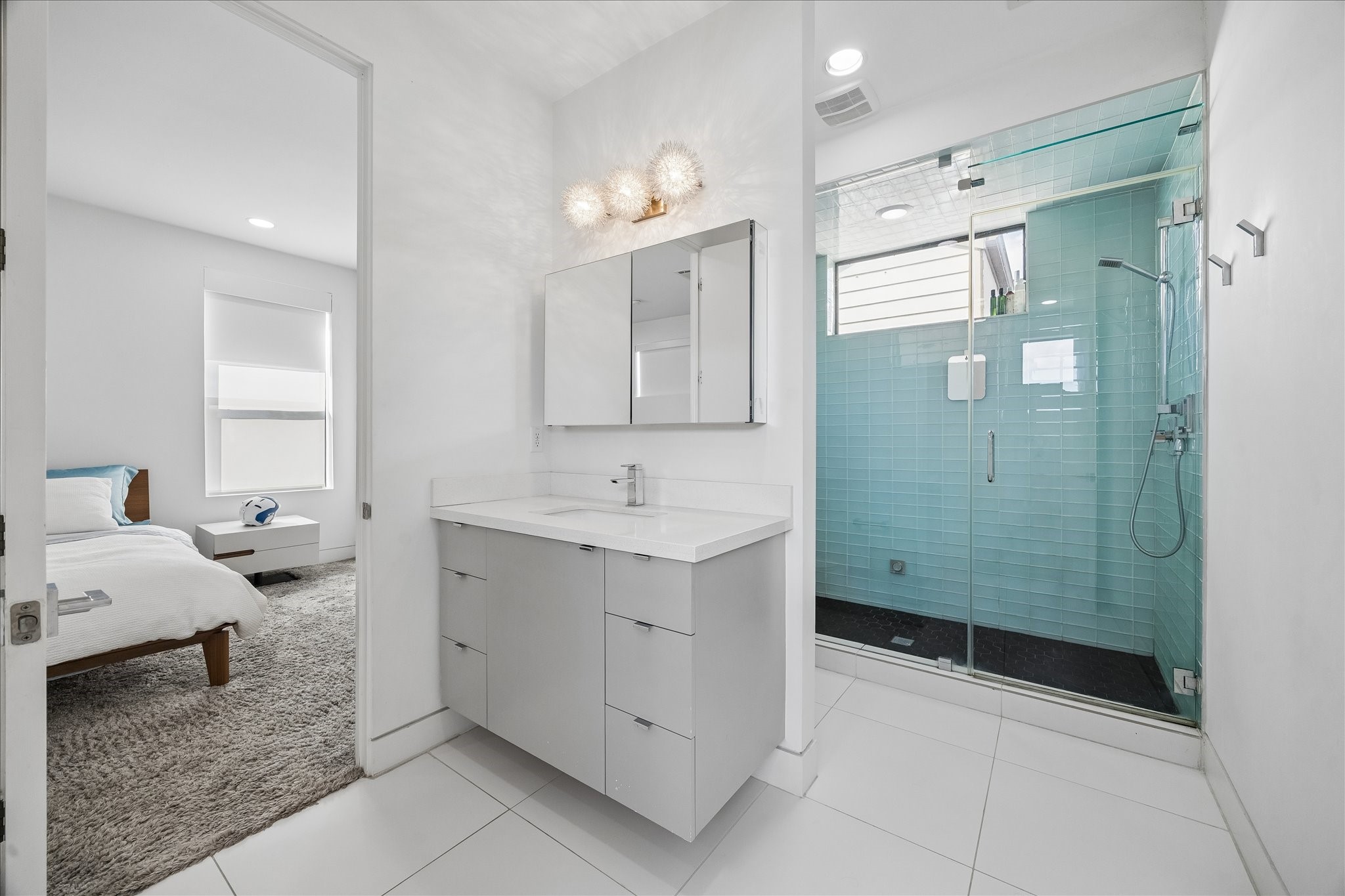 2014 Park Street Houston, TX 77019 - Photo 32 of 40 Bathroom for the 3rd floor. Floating cabinet, quartz counters and an energizing steam shower.