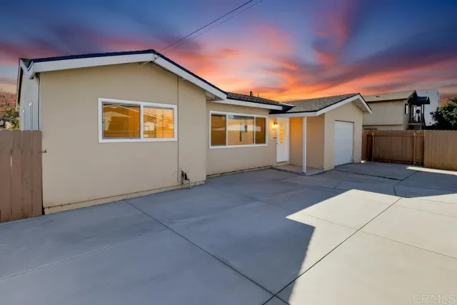 a front view of a house with yard