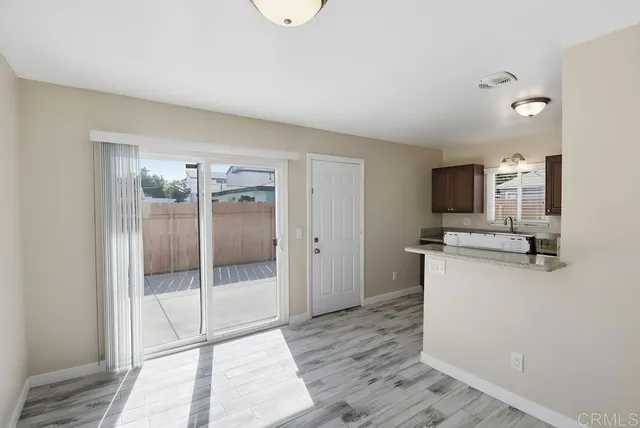 a room with a storage and utility room