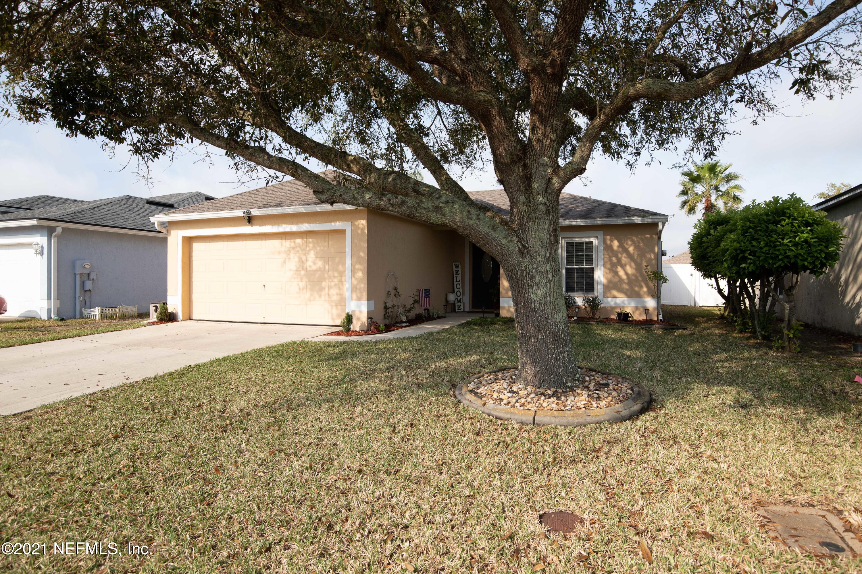 2602 Sunrise Ridge Lane Jacksonville, FL 32277 - Photo 3 of 35 a view of a house with a yard
