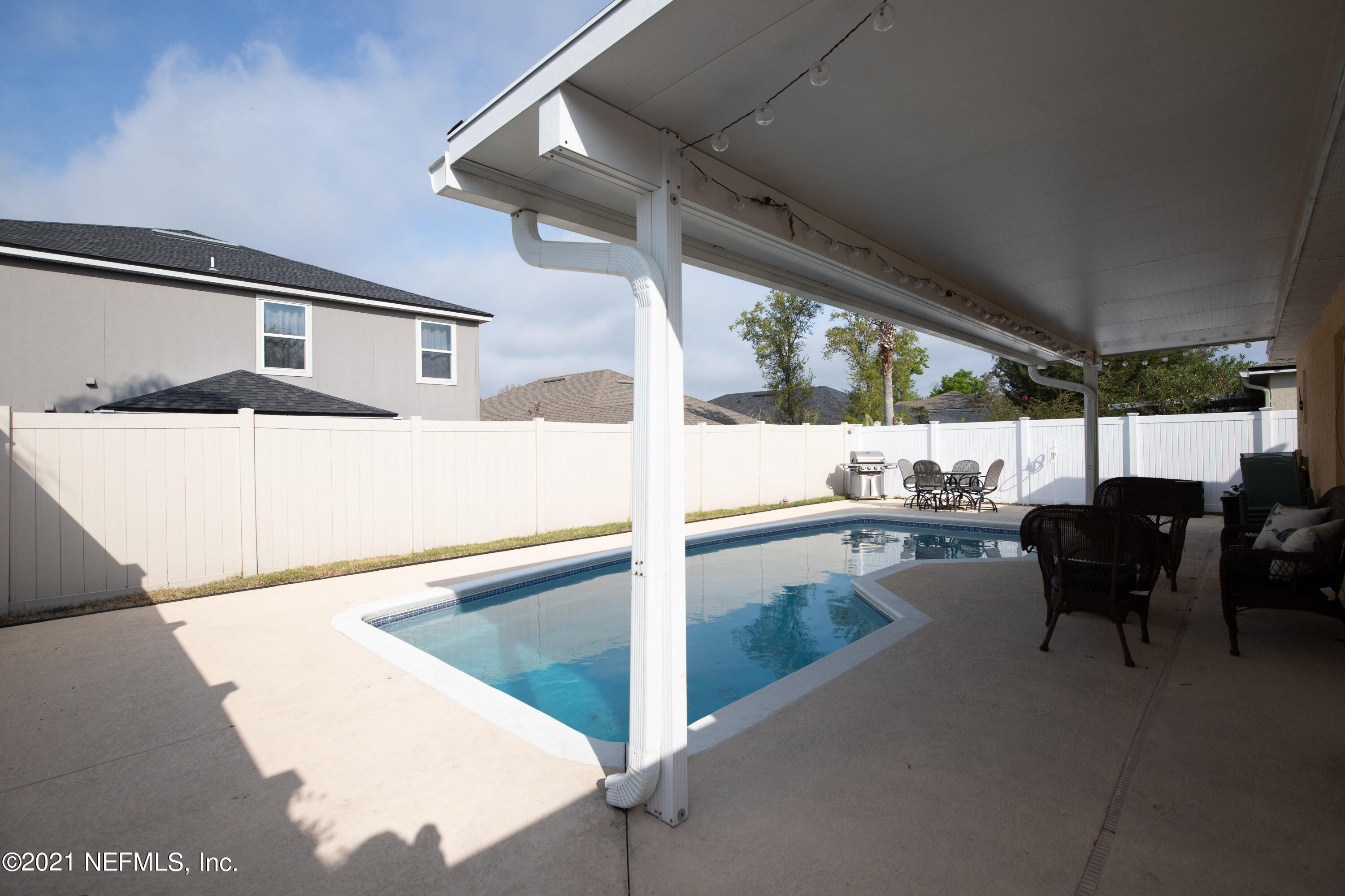 2602 Sunrise Ridge Lane Jacksonville, FL 32277 - Photo 31 of 35 a living room with furniture and a large window