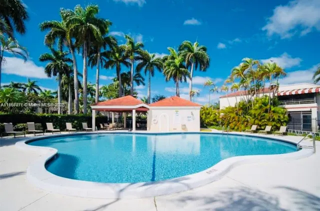 a view of a house with swimming pool