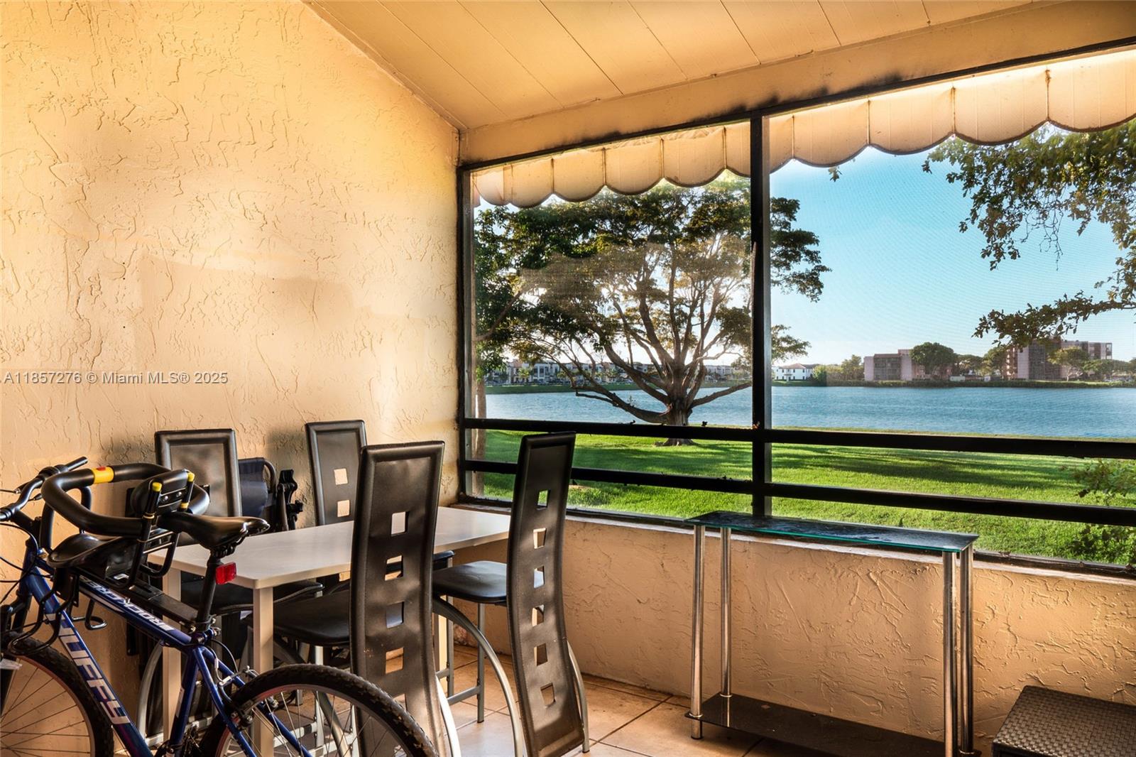 20300 Northeast 3rd Court, Unit 6 Miami, FL 33179 - Photo 10 of 14 a view of a chairs and table in the balcony