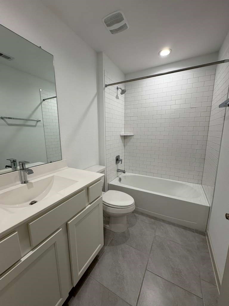 30018 Reagans Rnch Drive Fulshear, TX 77494 - Photo 26 of 30 a bathroom with a sink a toilet and shower