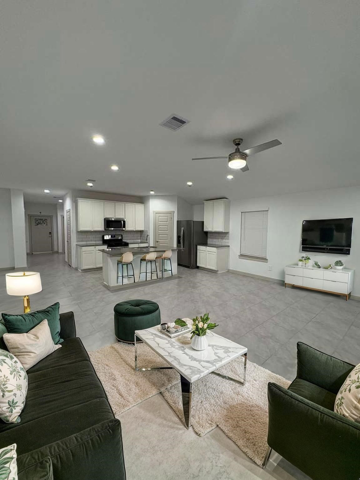 30018 Reagans Rnch Drive Fulshear, TX 77494 - Photo 3 of 30 a living room with furniture and a wooden floor