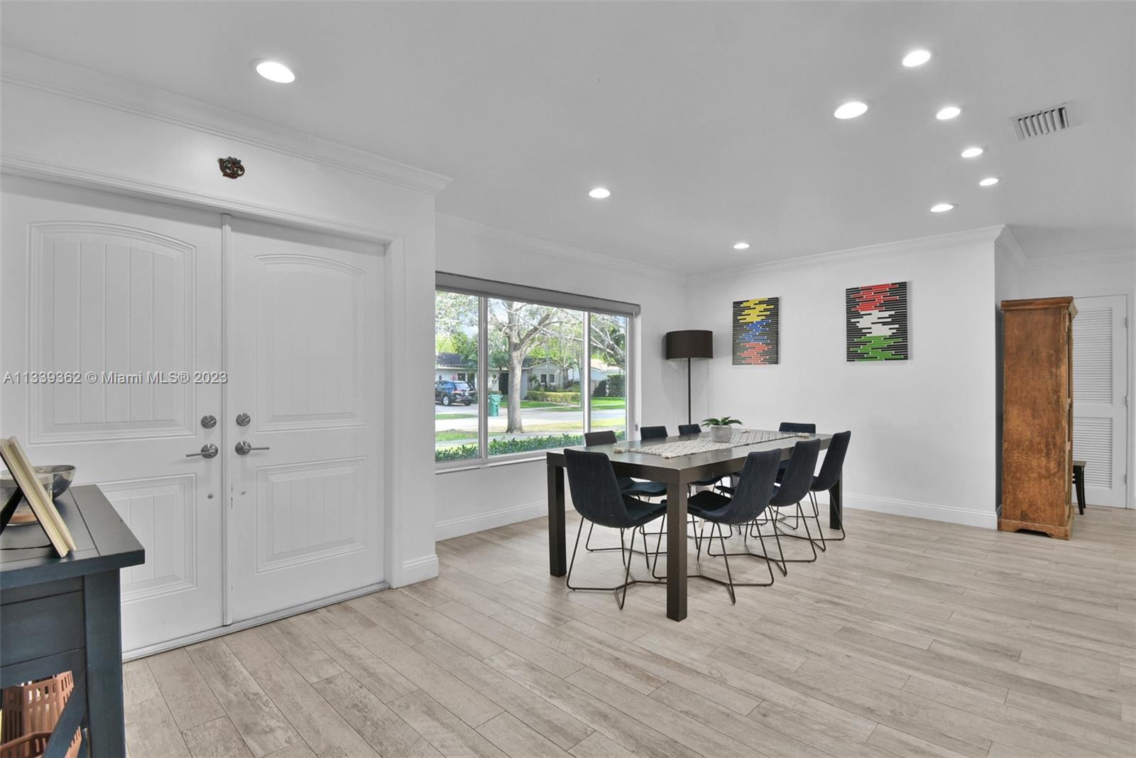 Dadeland Miami, FL 33173 - Photo 11 of 56 a view of a dining room with furniture and window