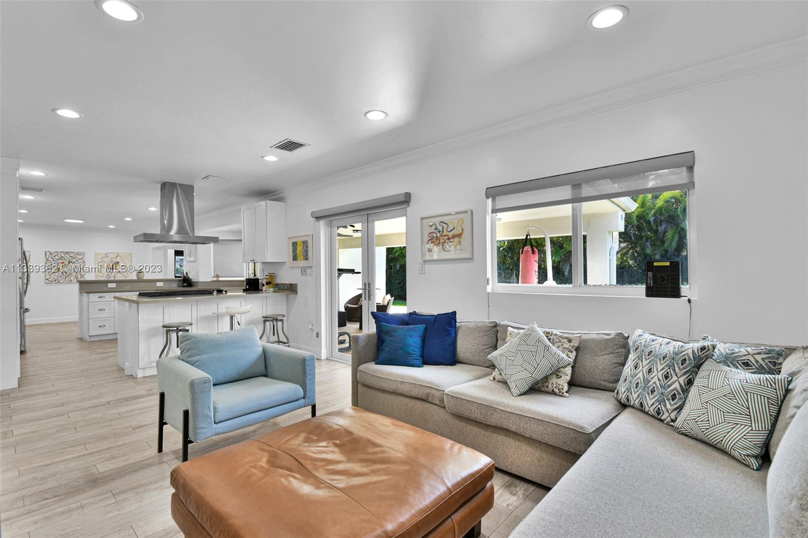 Dadeland Miami, FL 33173 - Photo 15 of 56 a living room with furniture and a large window