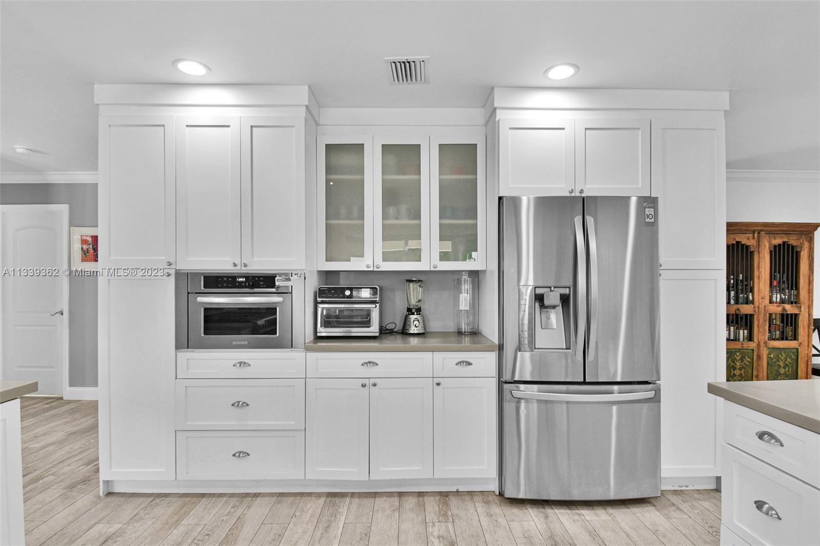 Dadeland Miami, FL 33173 - Photo 18 of 56 a kitchen with stainless steel appliances a refrigerator sink and cabinets