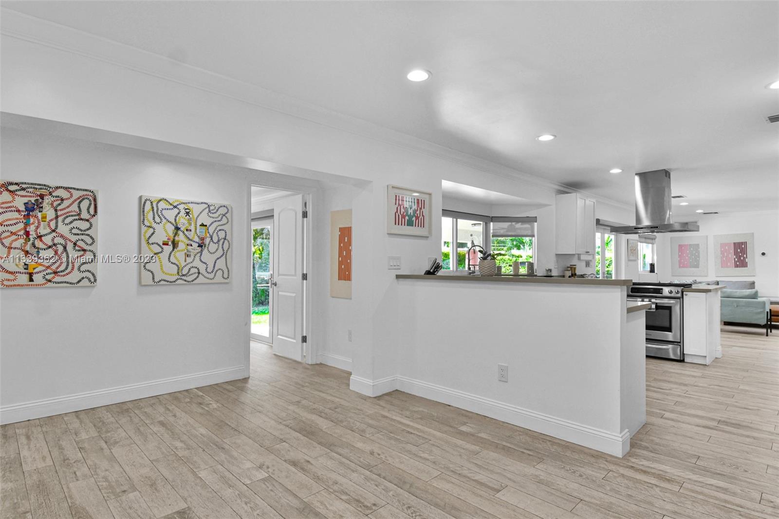 Dadeland Miami, FL 33173 - Photo 22 of 56 a view of a kitchen with furniture and wooden floor