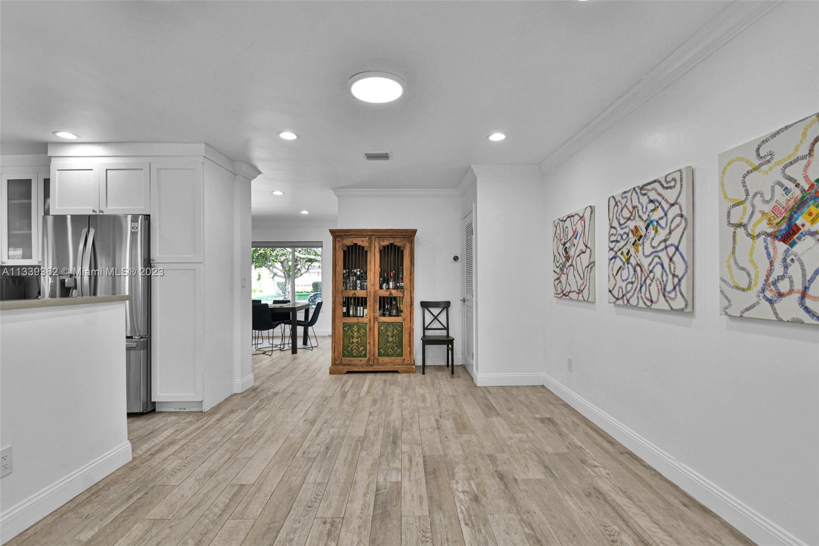Dadeland Miami, FL 33173 - Photo 23 of 56 a view of a room with furniture and wooden floor