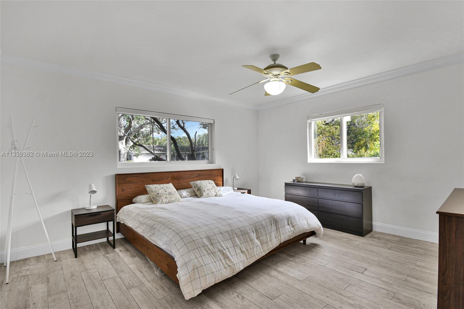 Dadeland Miami, FL 33173 - Photo 24 of 56 a bedroom with a bed and a window