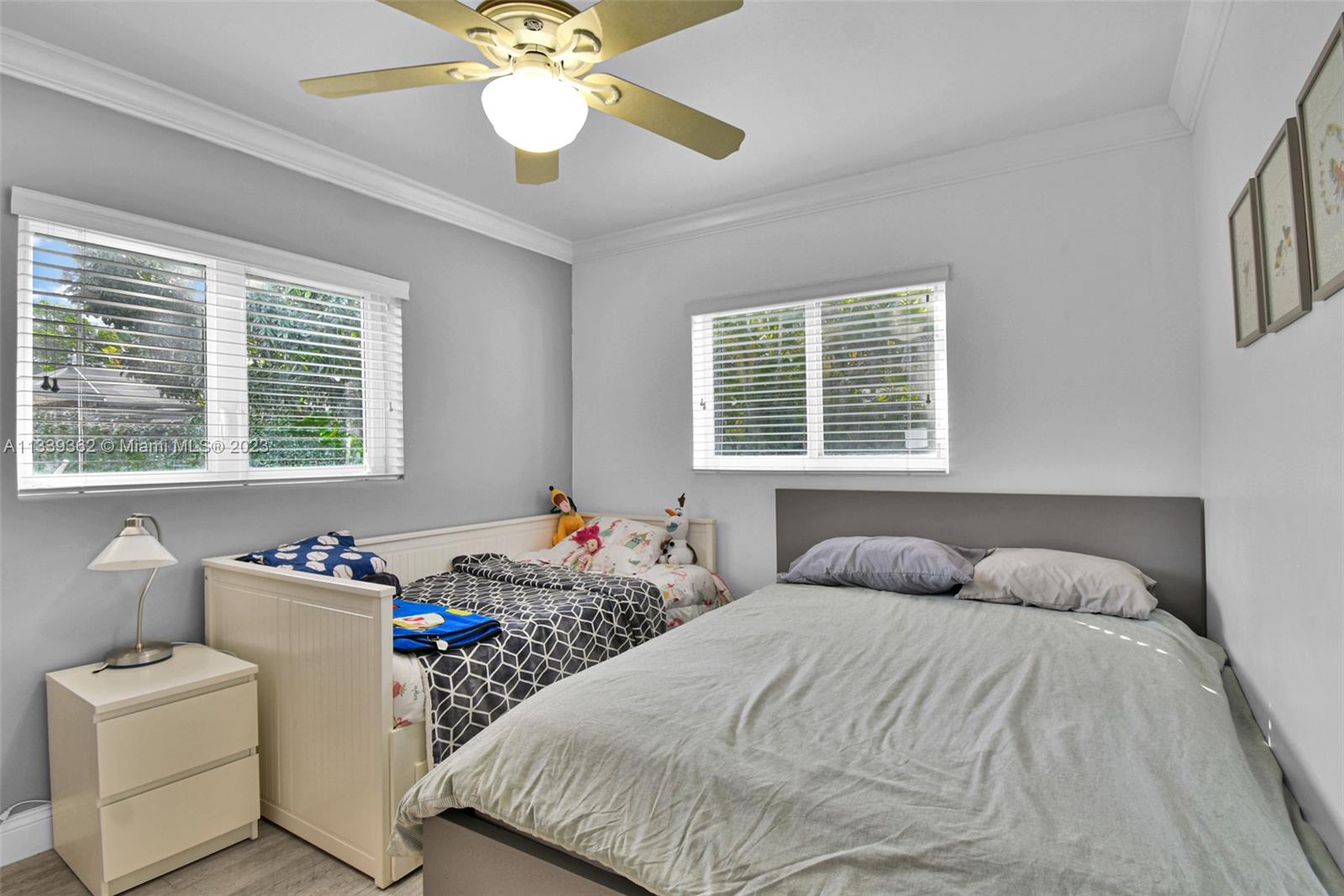 Dadeland Miami, FL 33173 - Photo 32 of 56 a bedroom with two beds and a window