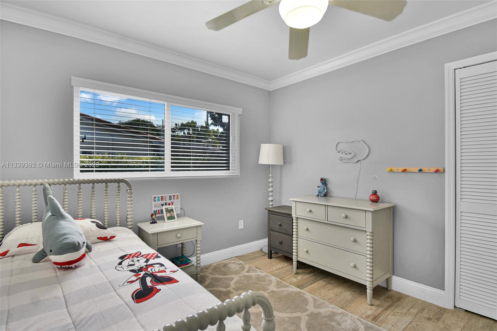 Dadeland Miami, FL 33173 - Photo 35 of 56 a bedroom with a bed and a window