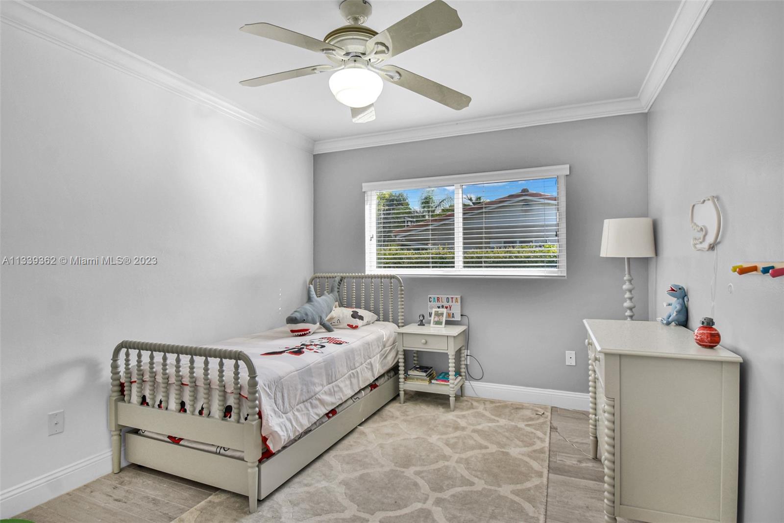 Dadeland Miami, FL 33173 - Photo 36 of 56 a bedroom with a bed and a table in it