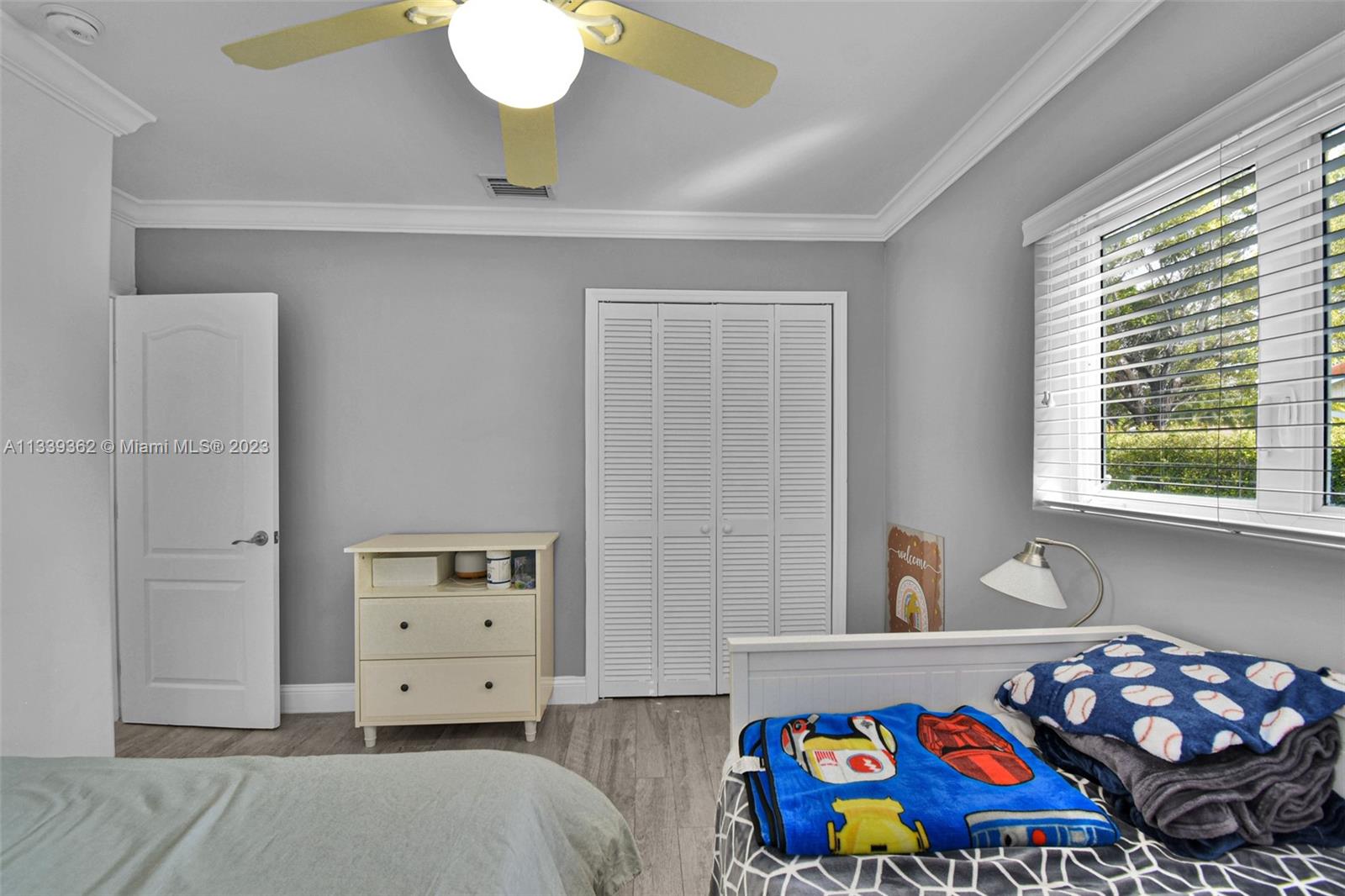 Dadeland Miami, FL 33173 - Photo 37 of 56 a bedroom with a bed and window