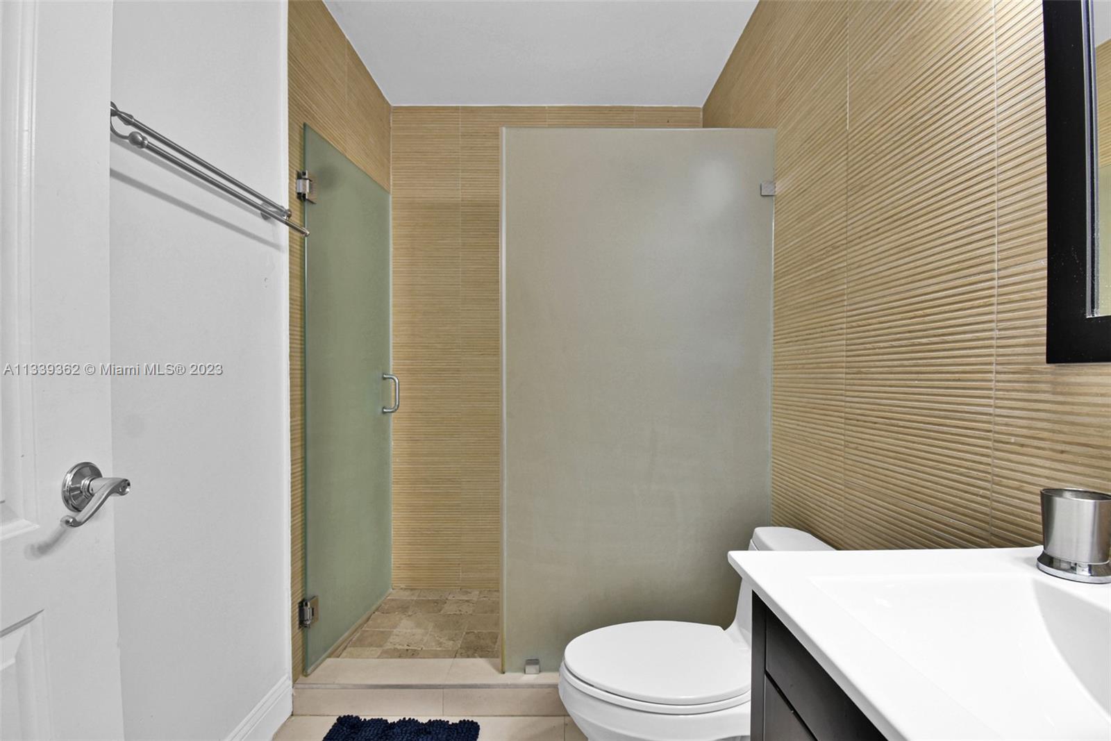 Dadeland Miami, FL 33173 - Photo 43 of 56 a bathroom with a sink a toilet and shower