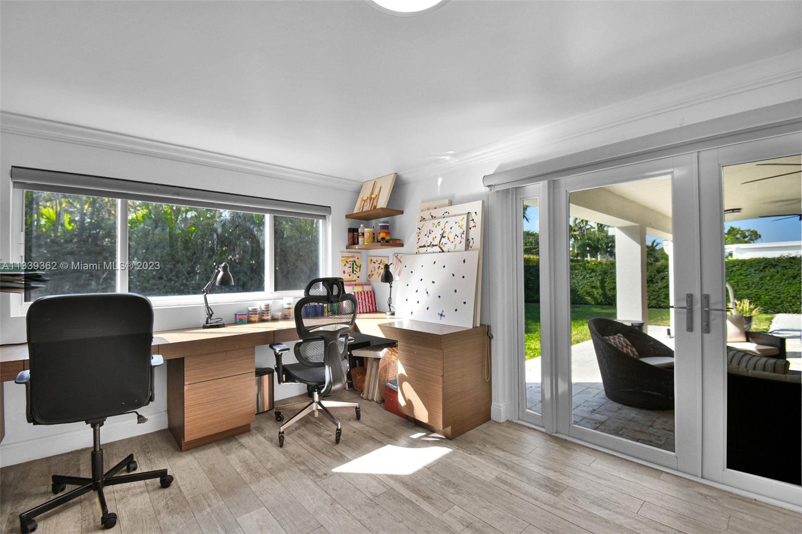 Dadeland Miami, FL 33173 - Photo 45 of 56 a view of a workspace with furniture and a window