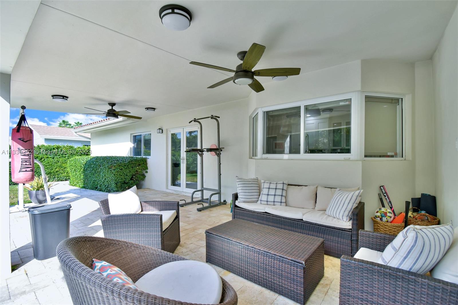 Dadeland Miami, FL 33173 - Photo 46 of 56 a living room with furniture and a ceiling fan