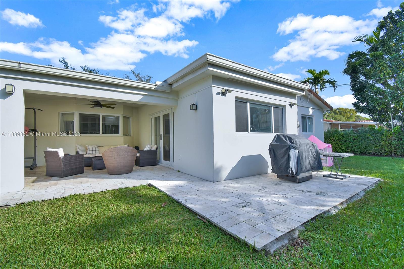 Dadeland Miami, FL 33173 - Photo 49 of 56 a view of a house with backyard and porch