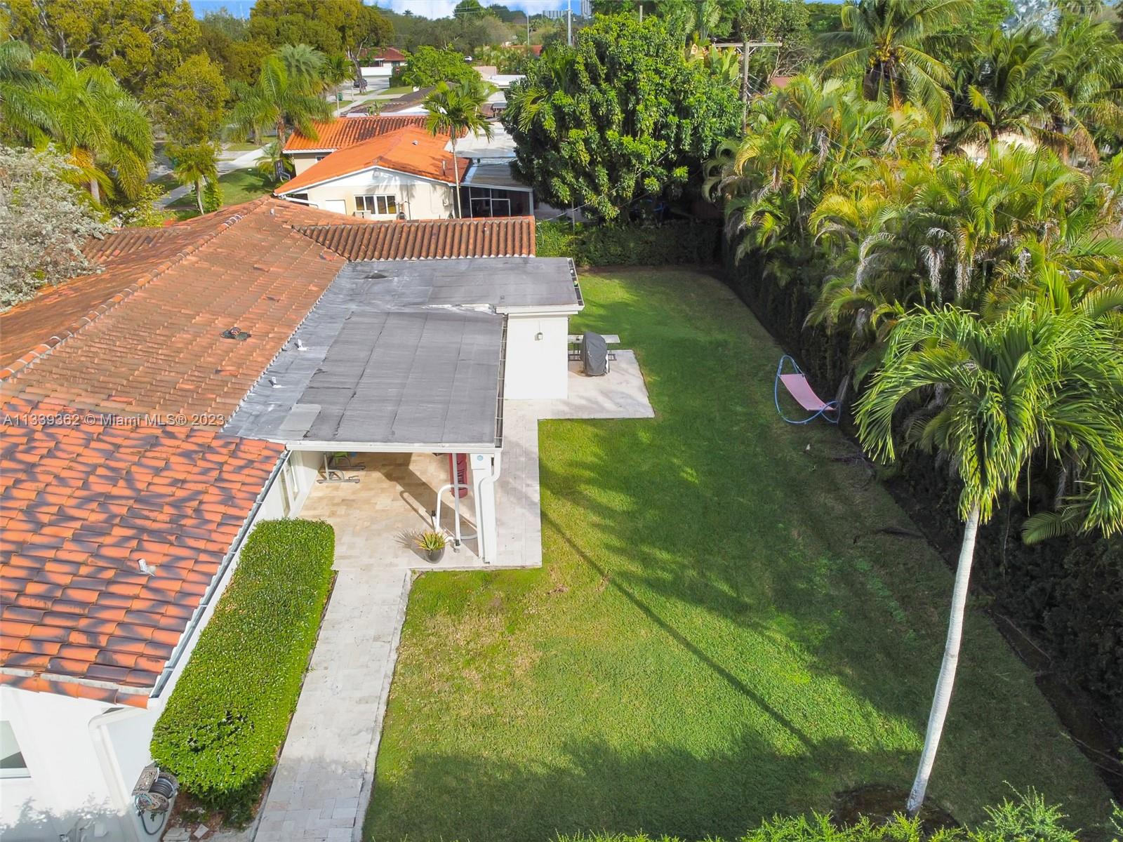 Dadeland Miami, FL 33173 - Photo 50 of 56 a view of a yard