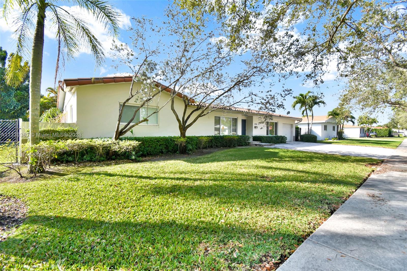 Dadeland Miami, FL 33173 - Photo 5 of 56 a view of house with a big yard and potted plants