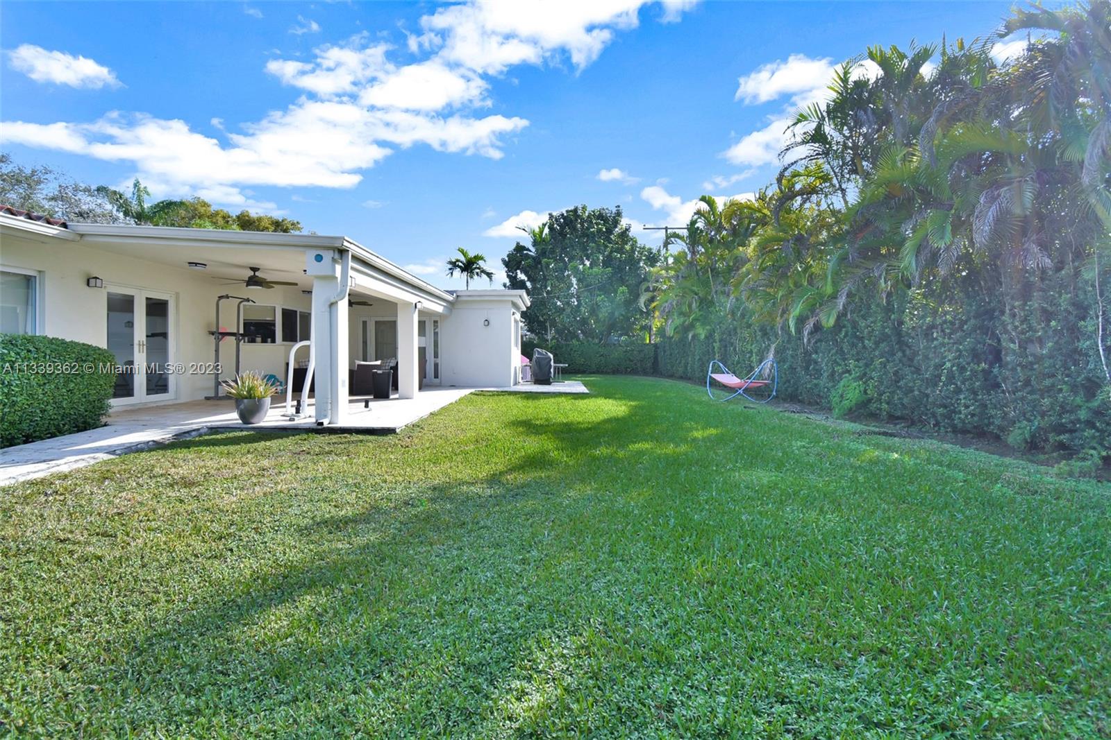 Dadeland Miami, FL 33173 - Photo 51 of 56 a view of a house with a backyard porch and sitting area