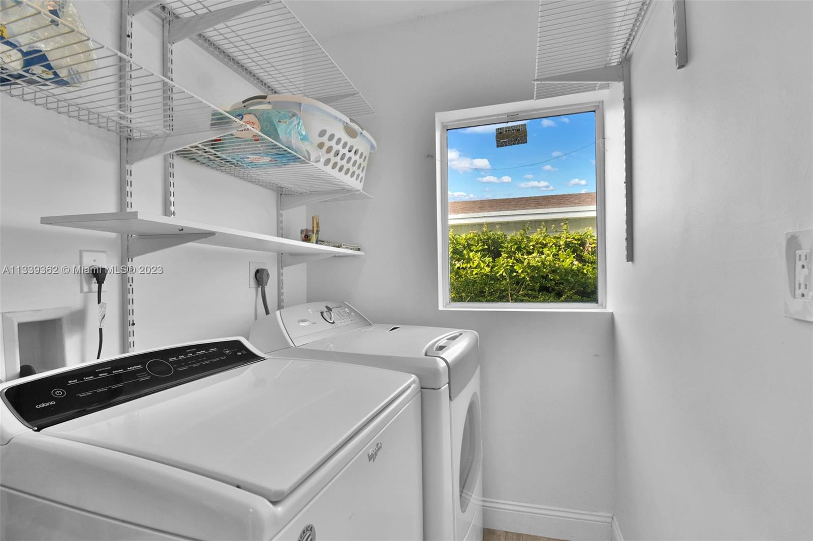 Dadeland Miami, FL 33173 - Photo 56 of 56 a utility room with dryer and washer