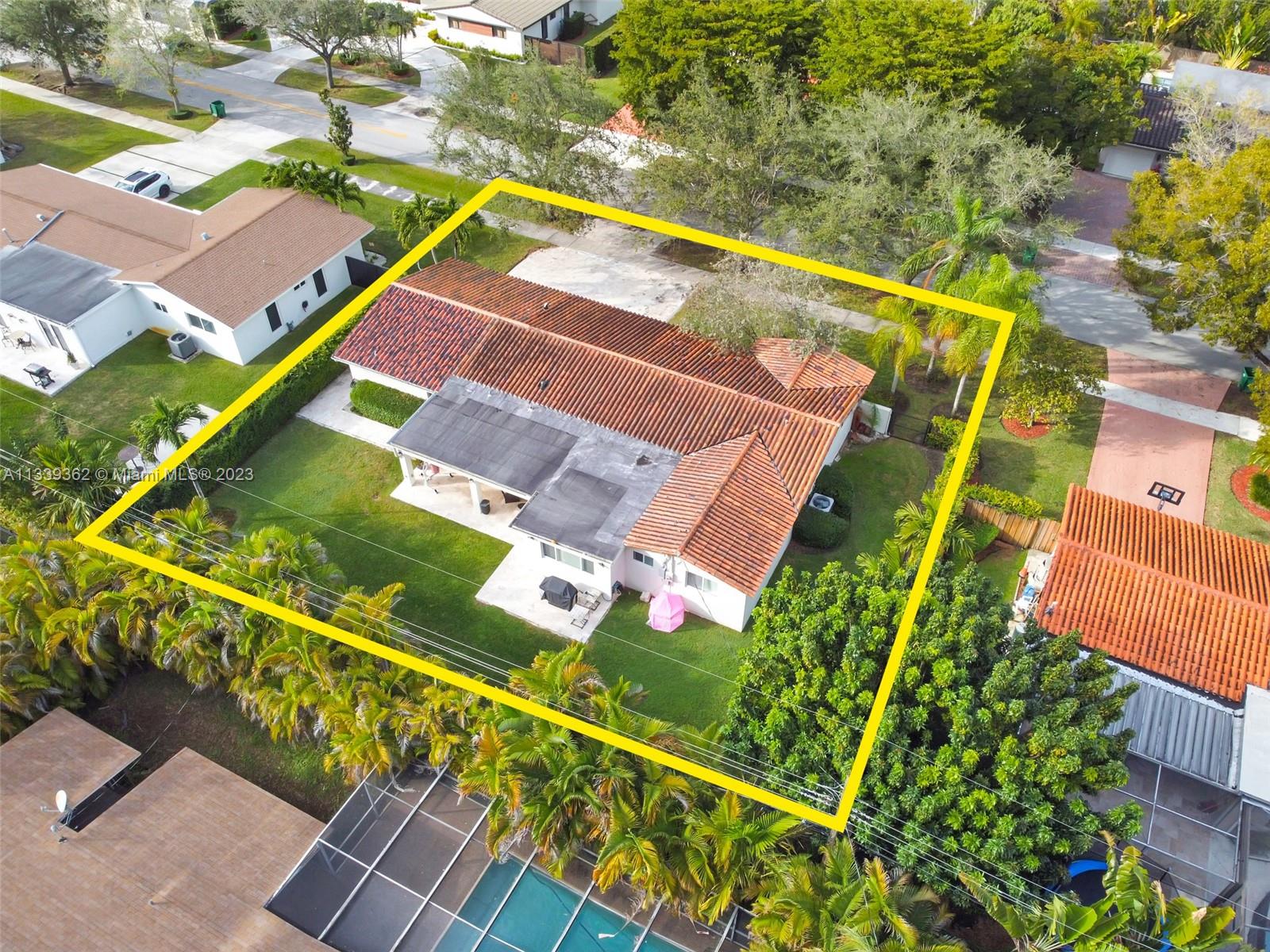 Dadeland Miami, FL 33173 - Photo 9 of 56 an aerial view of a tennis ground and a large pool