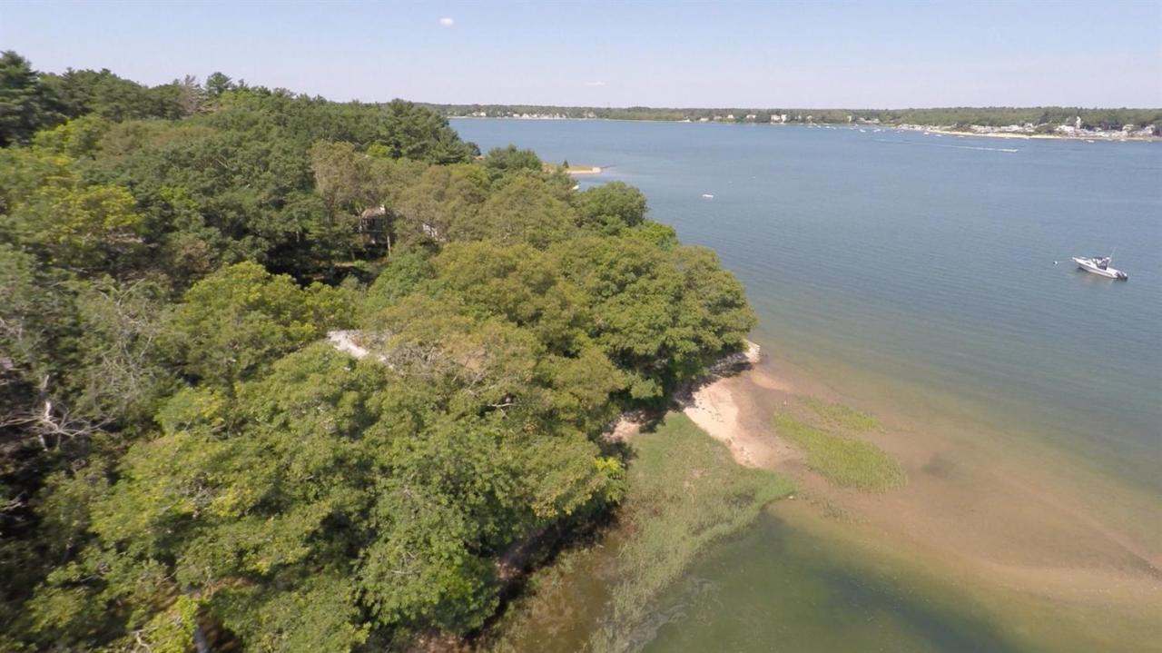 18 Quamhassett Road Buzzards Bay, MA 02532 - Photo 23 of 31 a view of a lake with a mountain