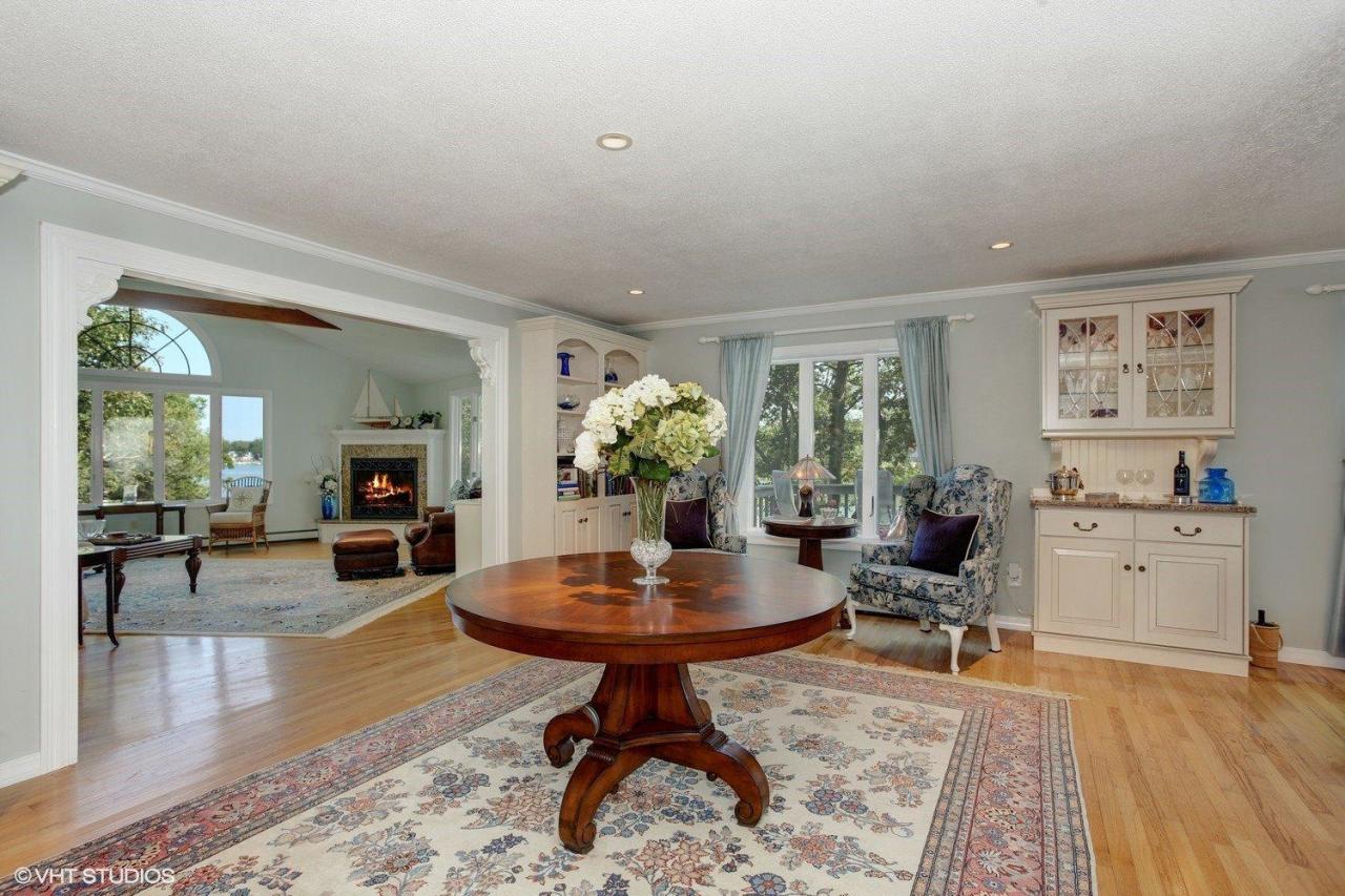 18 Quamhassett Road Buzzards Bay, MA 02532 - Photo 4 of 31 a living room with furniture a window and a table