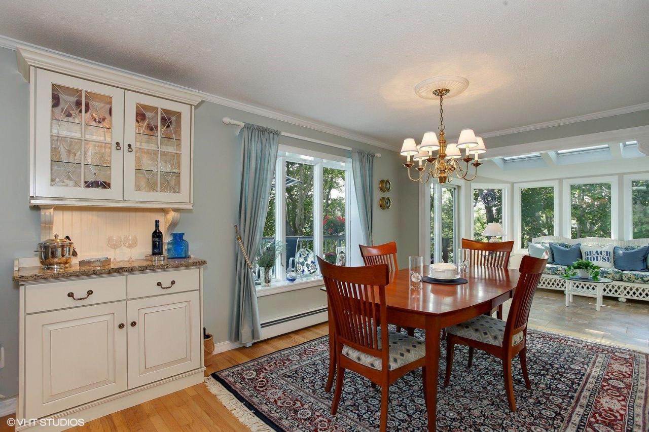 18 Quamhassett Road Buzzards Bay, MA 02532 - Photo 6 of 31 a view of a dining room with furniture window and outside view
