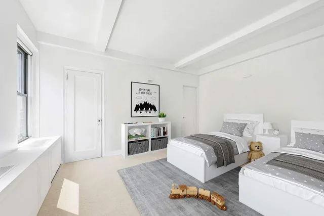 a bedroom with furniture and a wooden floor