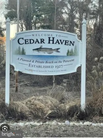 a view of outdoor space with signage and flags