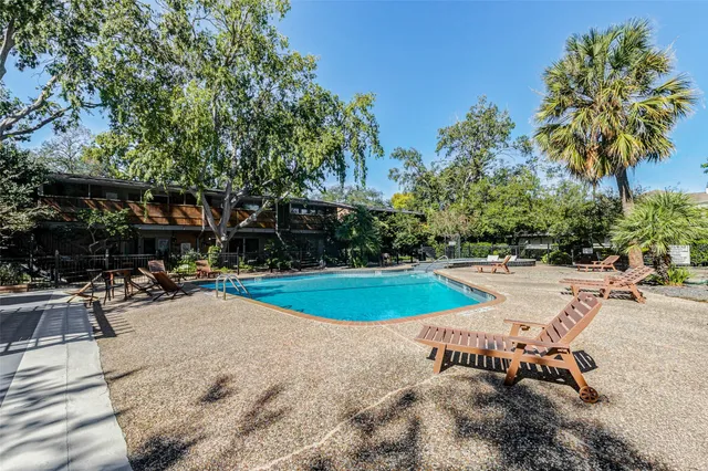 a view of outdoor space swimming pool and patio