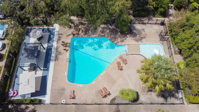 an aerial view of house with yard