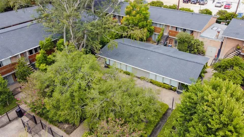 a view of a city with tall buildings