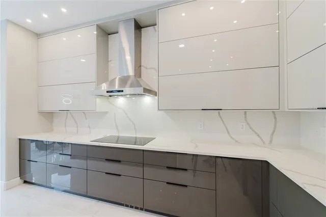 a kitchen with a sink and cabinets