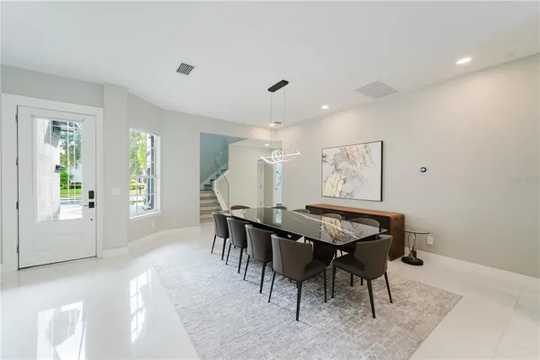 a view of a dining room with furniture