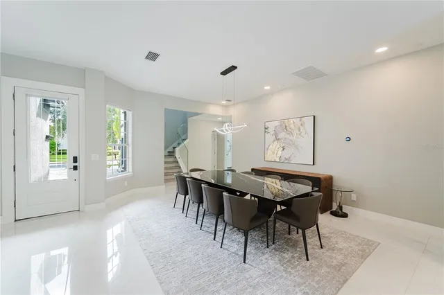 a view of a dining room with furniture