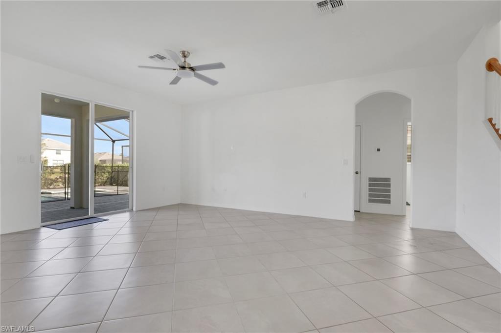 2553 Kona Way Naples, FL 34120 - Photo 19 of 27 a view of an empty room with a window