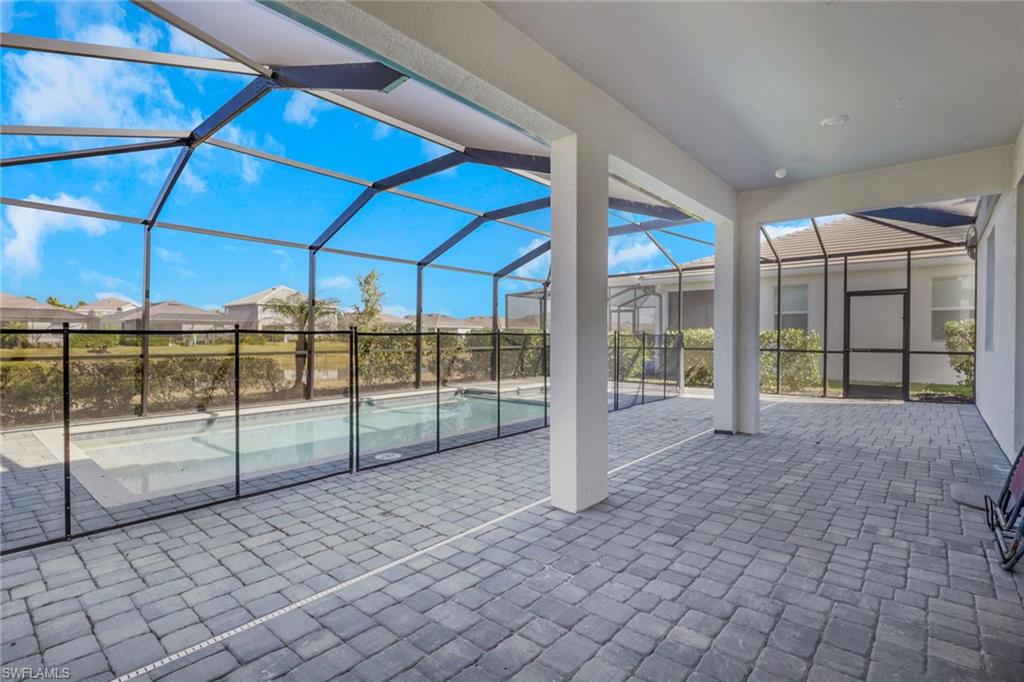 2553 Kona Way Naples, FL 34120 - Photo 22 of 27 a view of a backyard