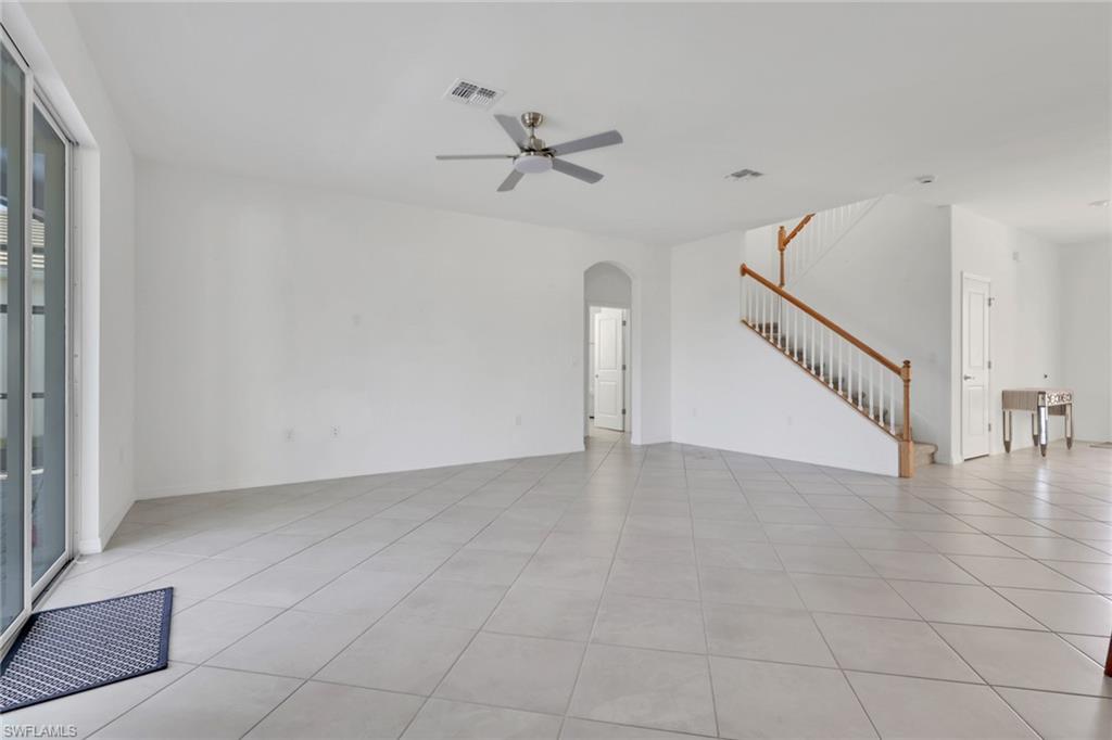 2553 Kona Way Naples, FL 34120 - Photo 10 of 27 a view of an empty room with a window