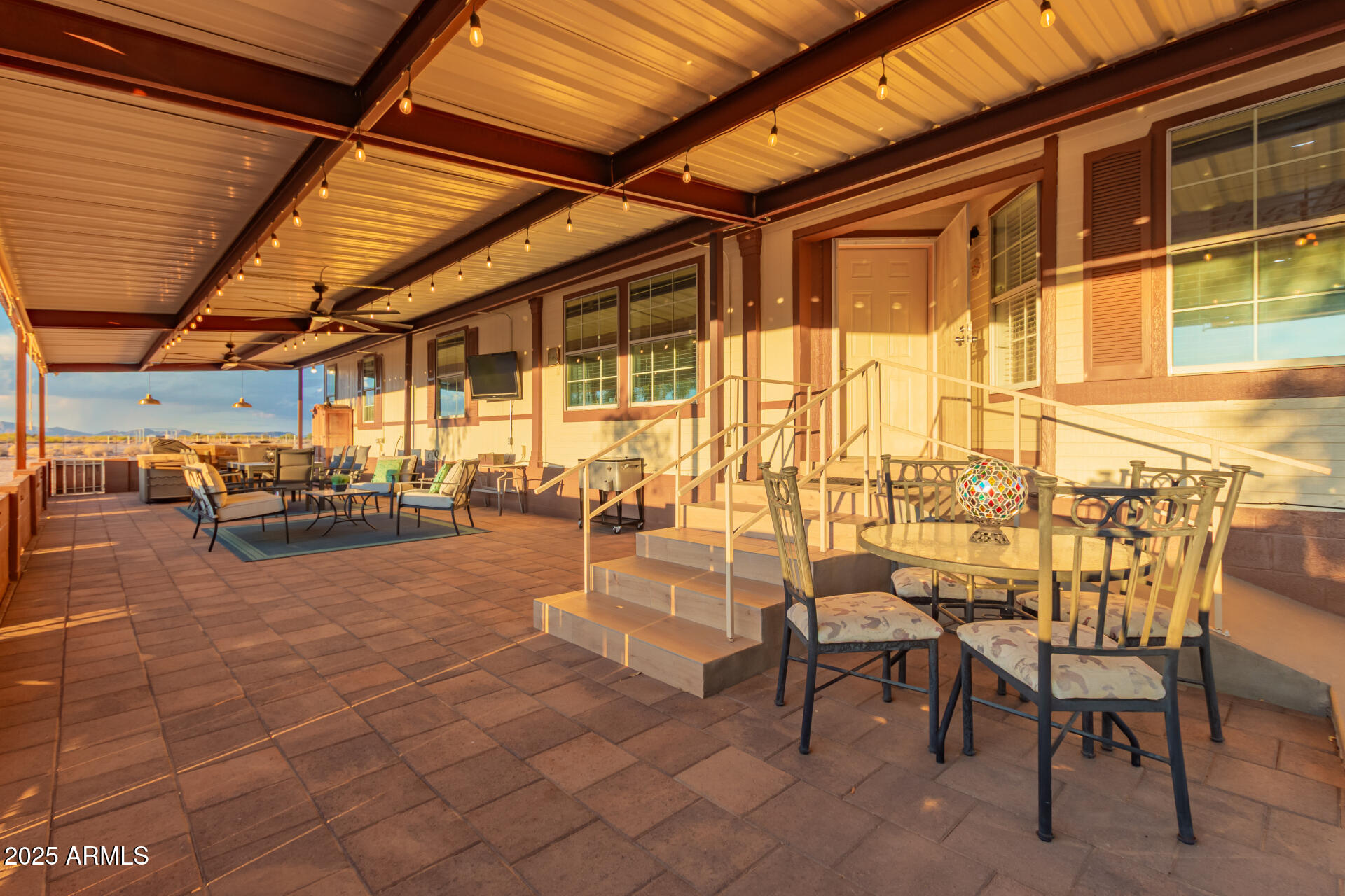 39234 West Buckeye Road Tonopah, AZ 85354 - Photo 29 of 40 a outdoor space with lots of furniture and a shower