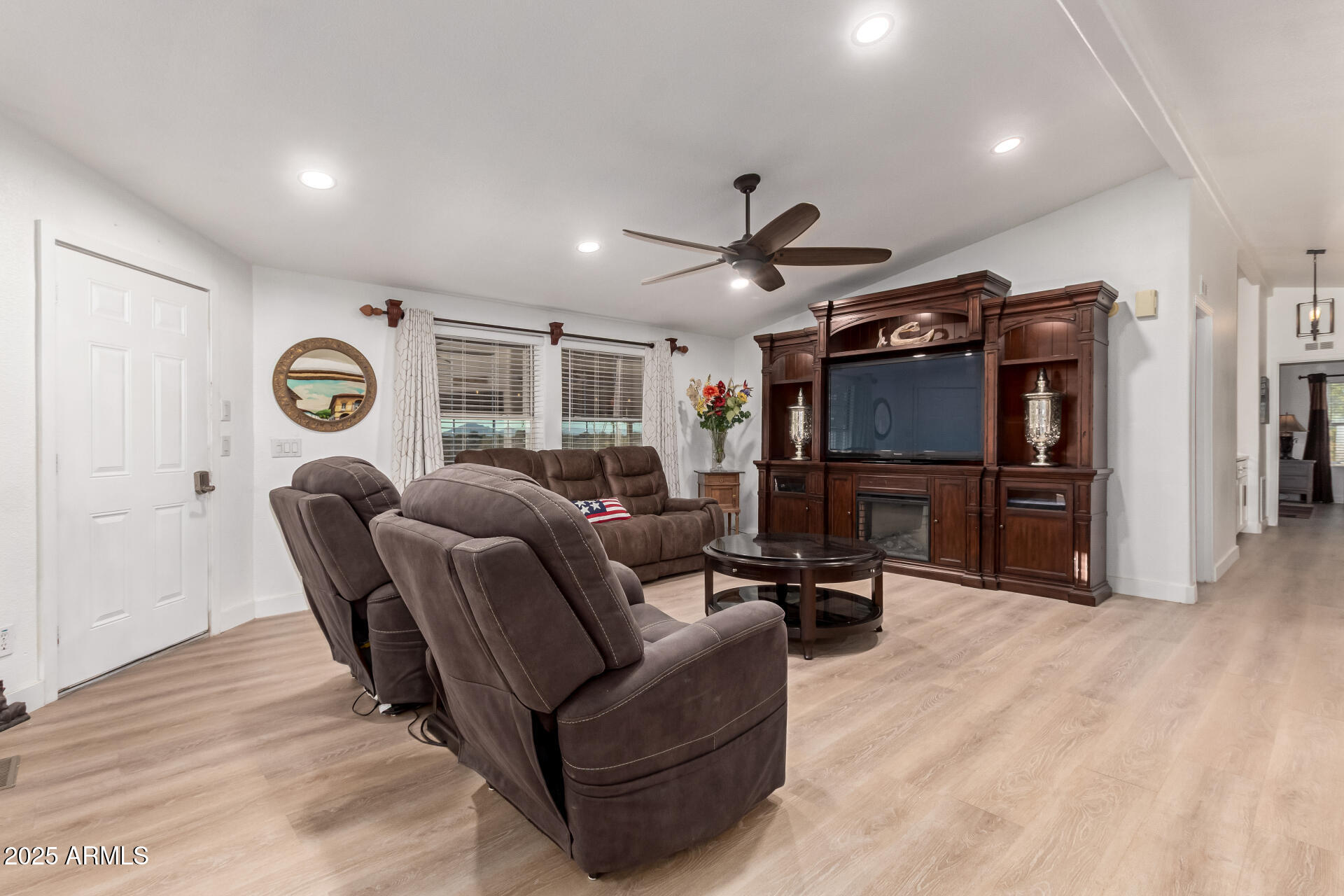 39234 West Buckeye Road Tonopah, AZ 85354 - Photo 6 of 40 a living room with furniture and a flat screen tv