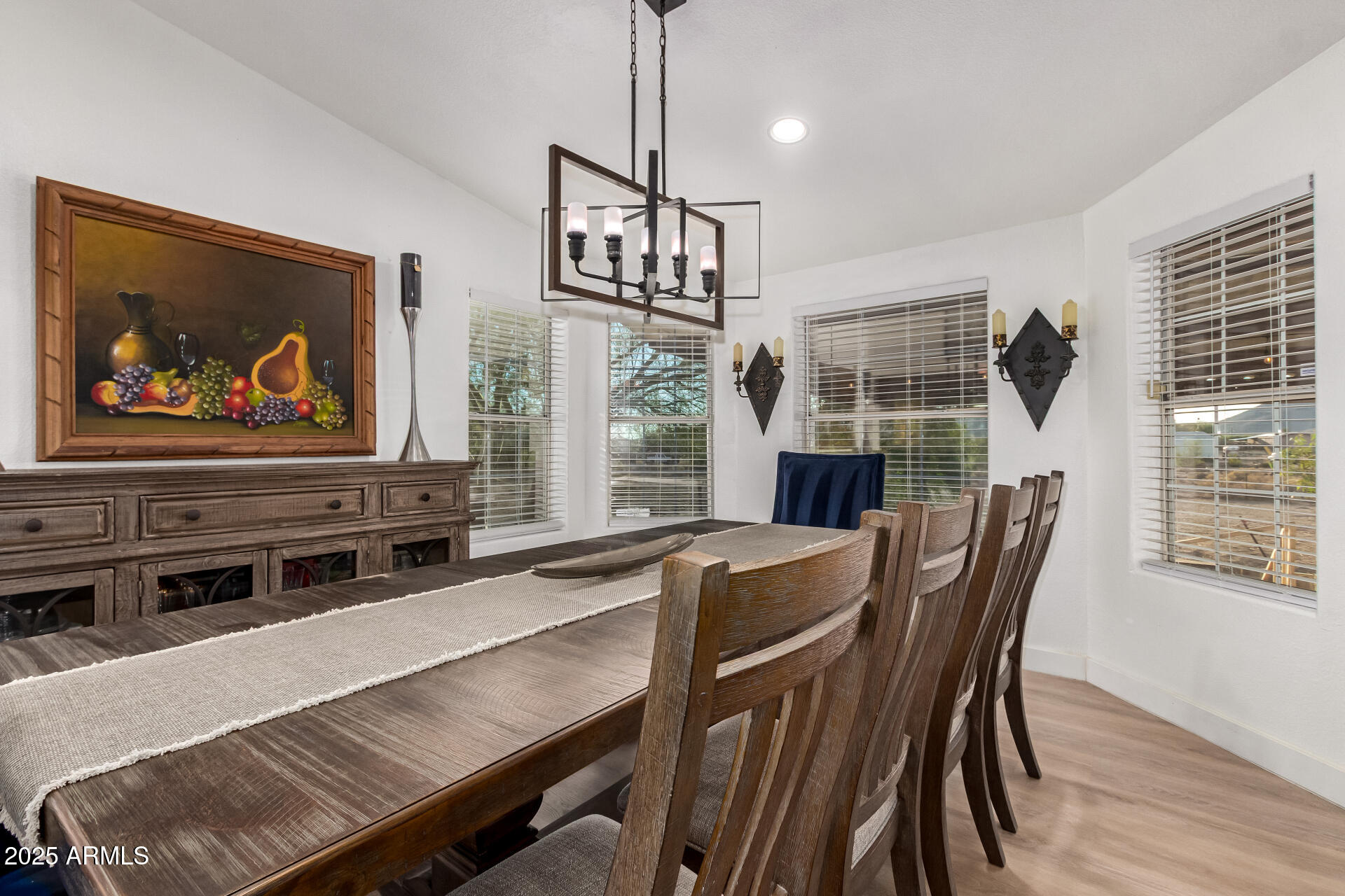 39234 West Buckeye Road Tonopah, AZ 85354 - Photo 8 of 40 a view of a dining room with furniture window and wooden floor