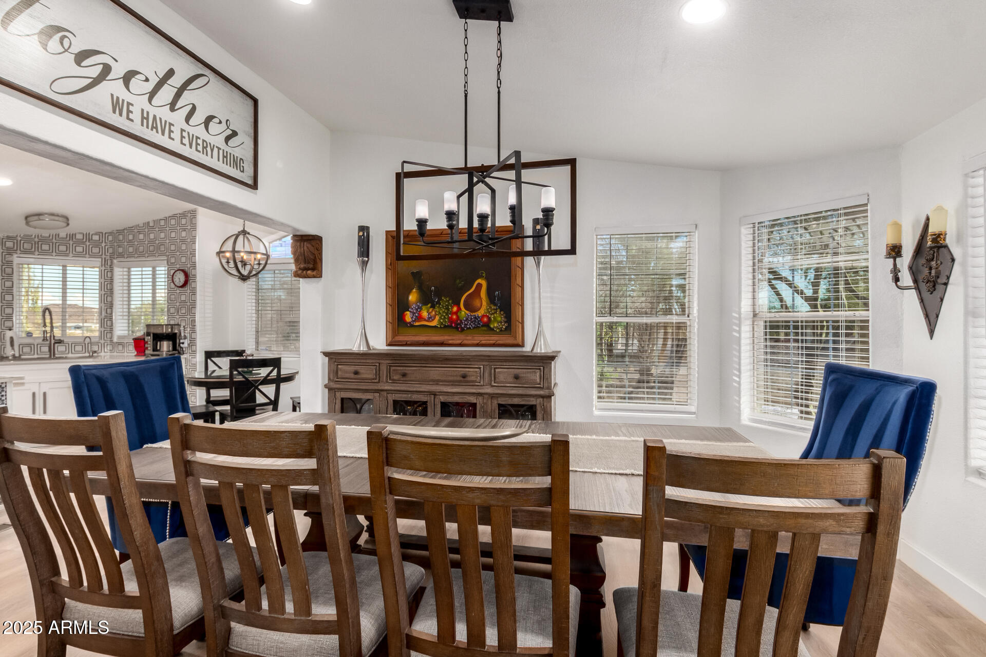 39234 West Buckeye Road Tonopah, AZ 85354 - Photo 9 of 40 a dining room with furniture a chandelier and window